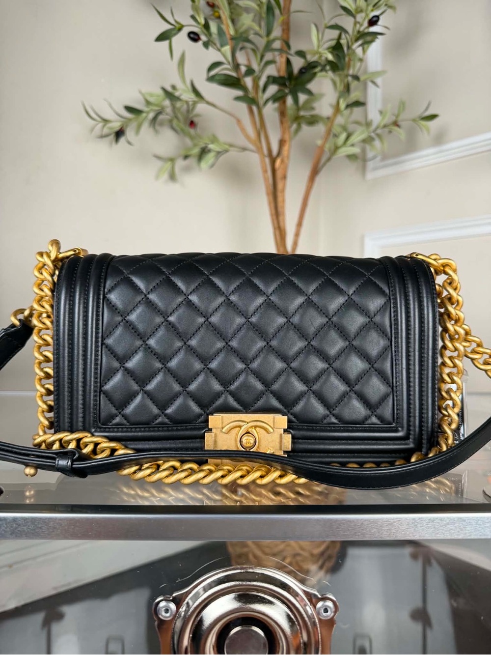 CHANEL Black Quilted Leather Crossbody with Gold Chain